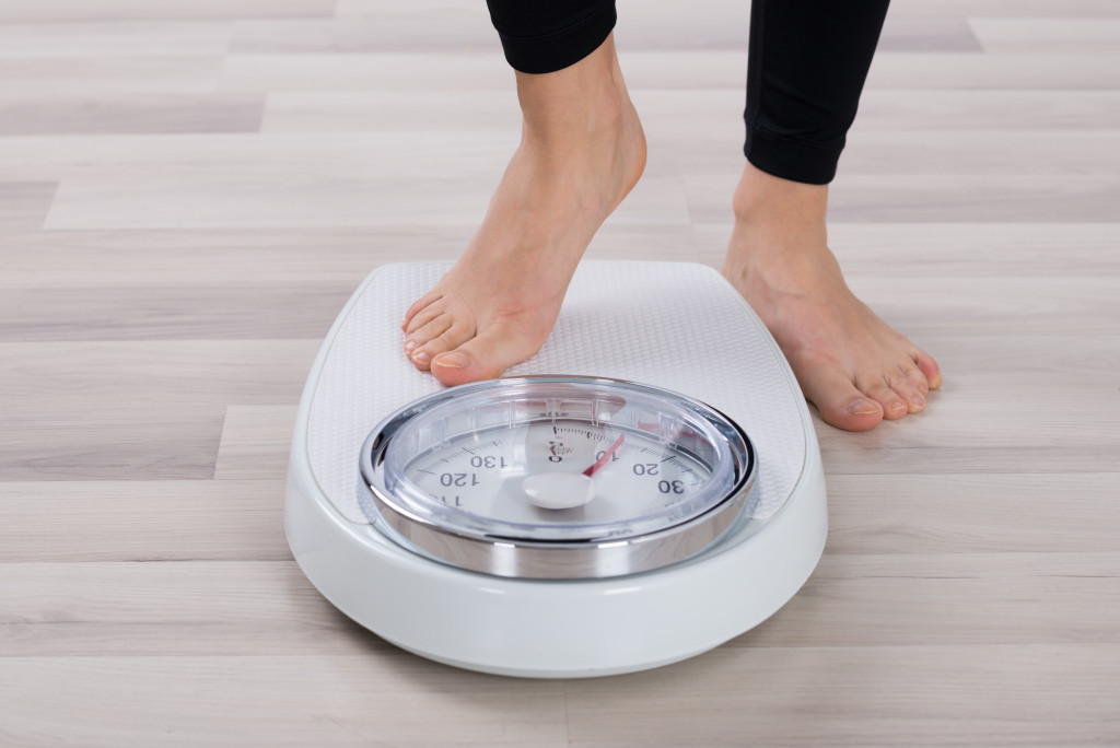 Standing On Weighing Scale