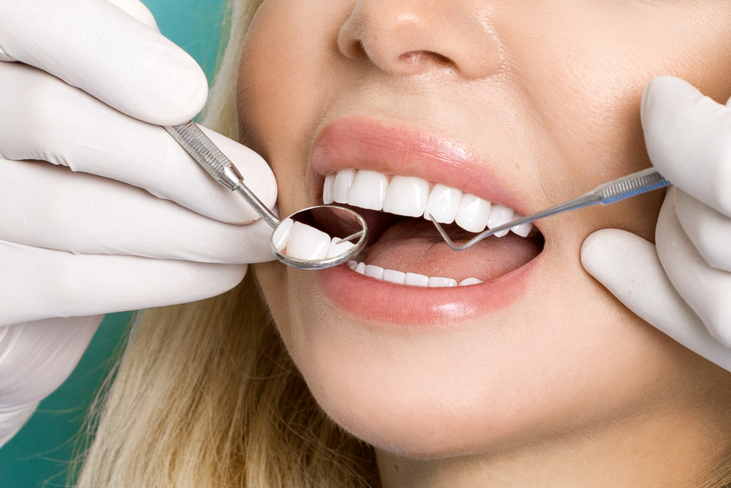 A woman getting new veneers