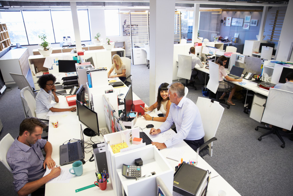 People working in a busy office in a city.