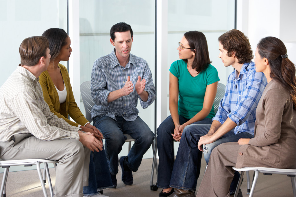 A man talking in a support group