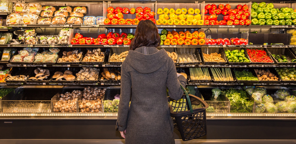 Woman picking groceries healthily