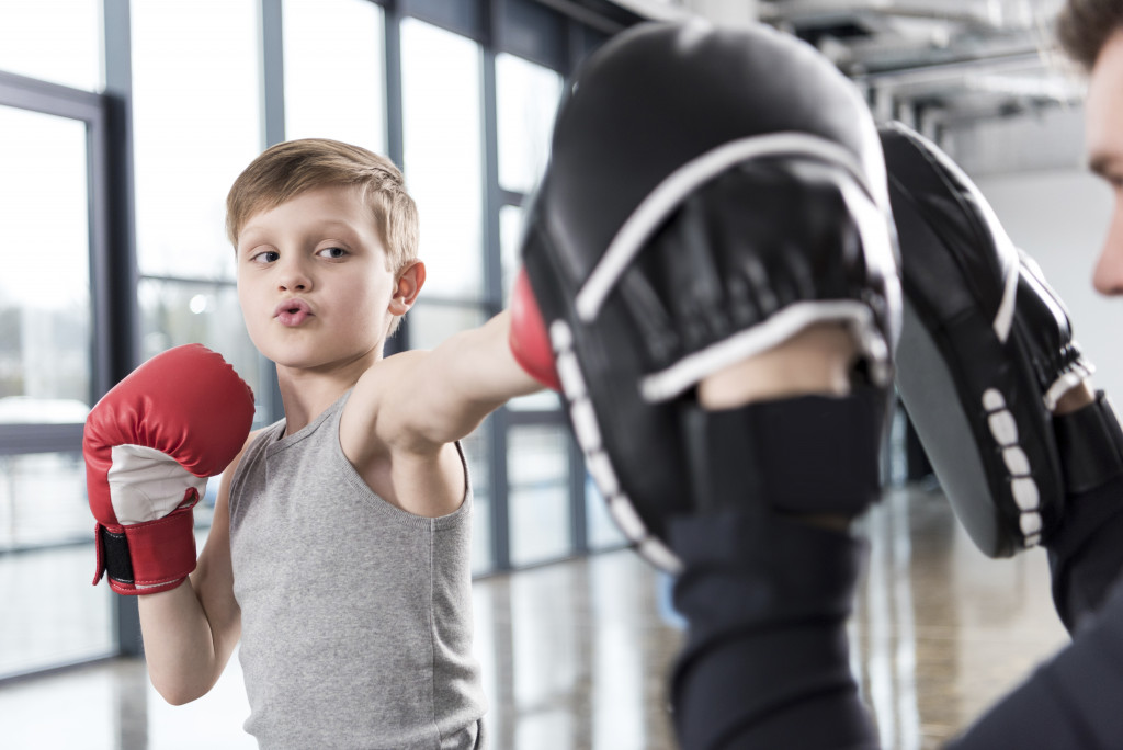 little boy boxing exercise