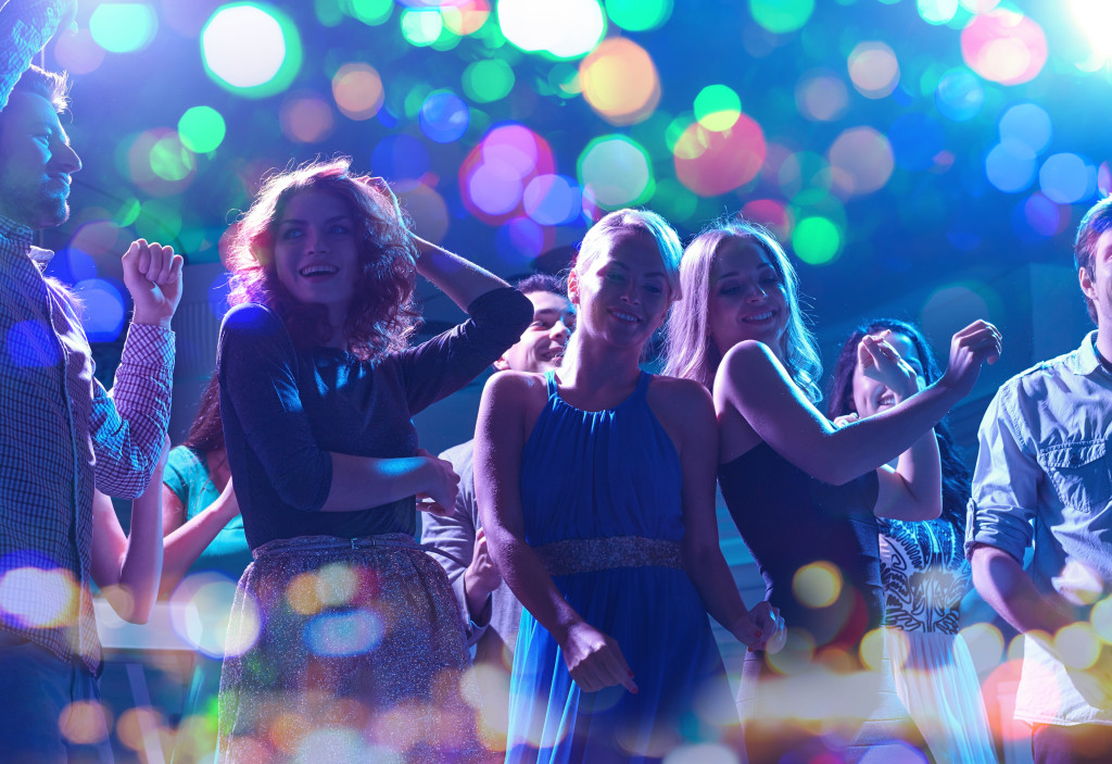 group of women dancing in night club