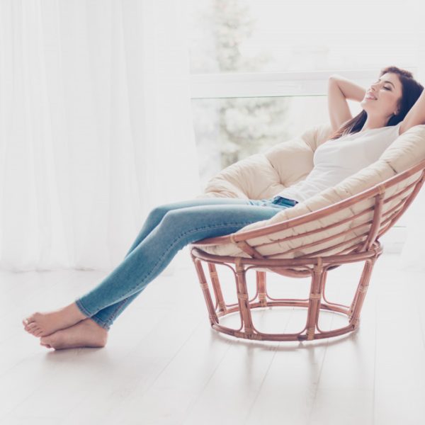 woman sitting and relaxing in her home