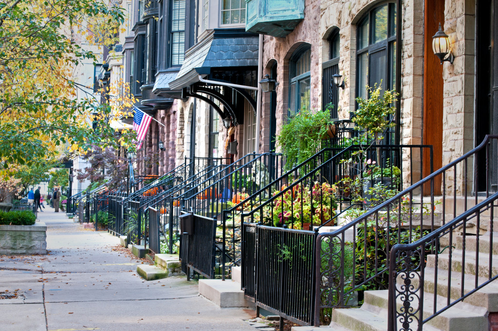 Residential street in a city with apartments along the side.