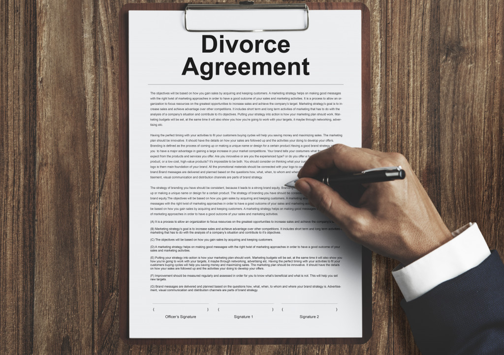 divorce agreement being signed by lawyer